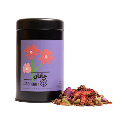 دمنوش جانان در بستهبندی مشکی با لیبل بنفش، حاوی گل محمدی، توتفرنگی خشک، چای سیب، به، دارچین و هل – محصول فروشگاه پابلوکافی